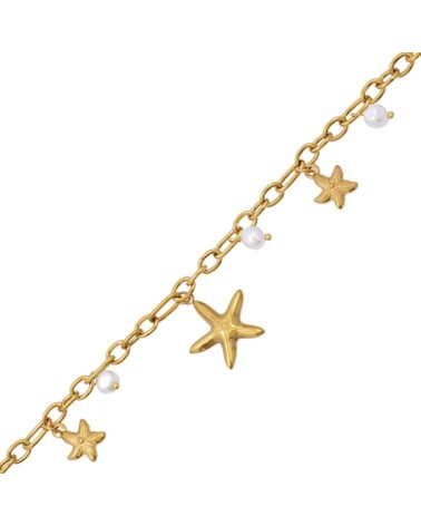 TOBILLERA CON COLGANTES EN PERLAS Y ESTRELLAS DE MAR ACERO DORADO